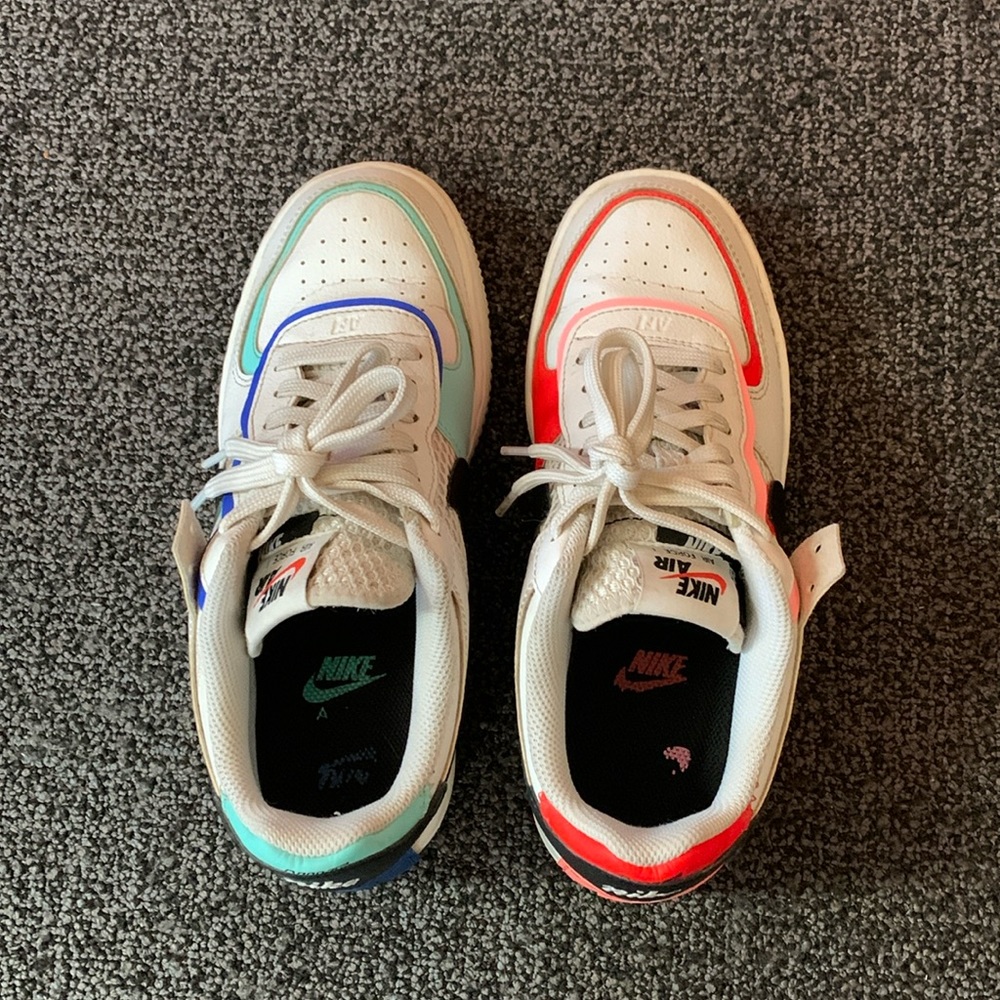 Nike Air Force 1 Low Shadow, one red and one blue, size 7